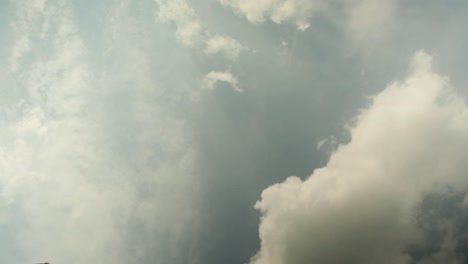 dynamic timelapse of shifting clouds in a stormy sky, showcasing nature's moody ambiance