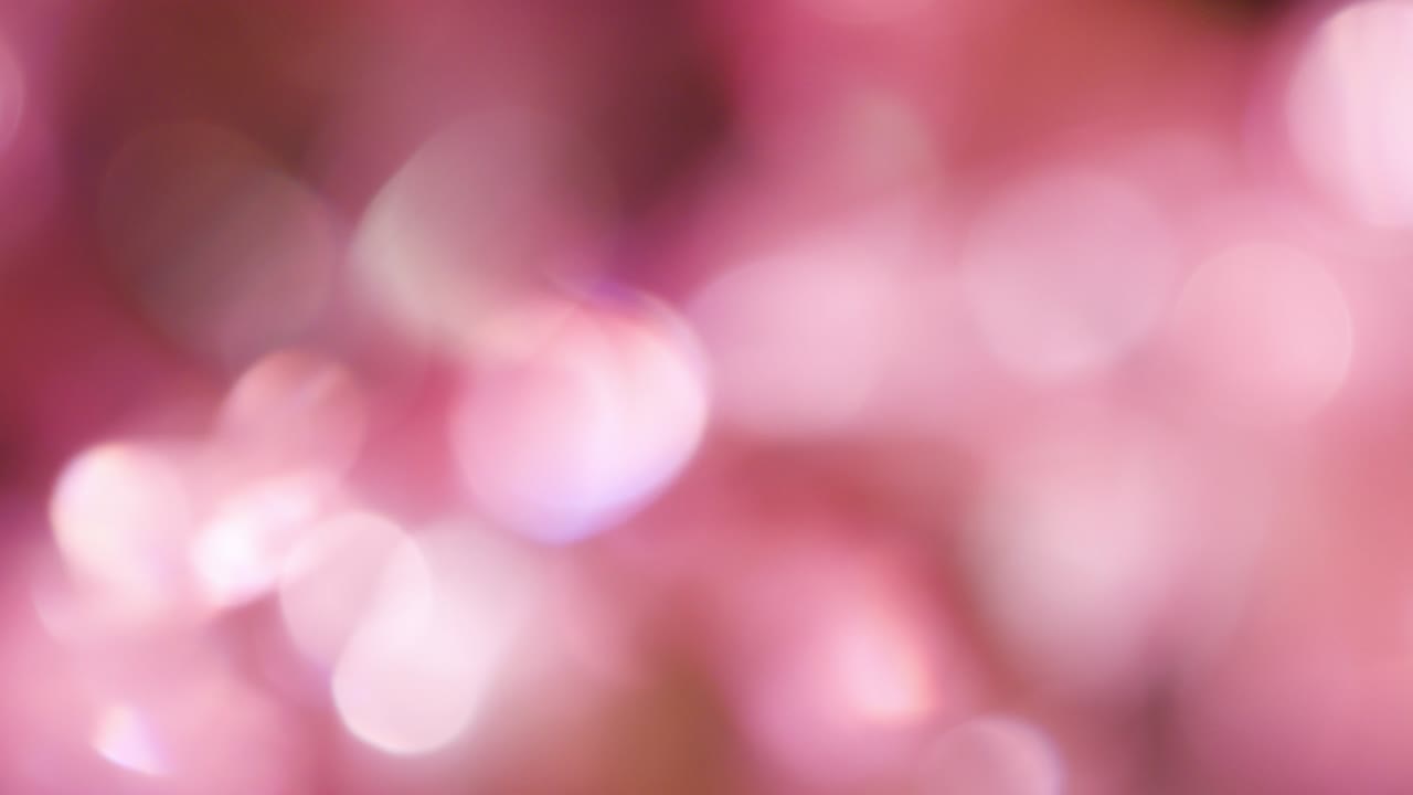 la rotación de los círculos bokeh en el sentido de las agujas del reloj