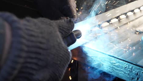 close-up work with metal steel and iron using a welding machine