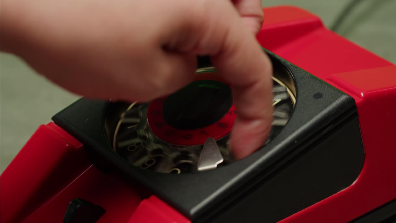 Retro vintage phone, A yellow rotary telephone is displayed on a wooden desk, adding a nostalgic touch