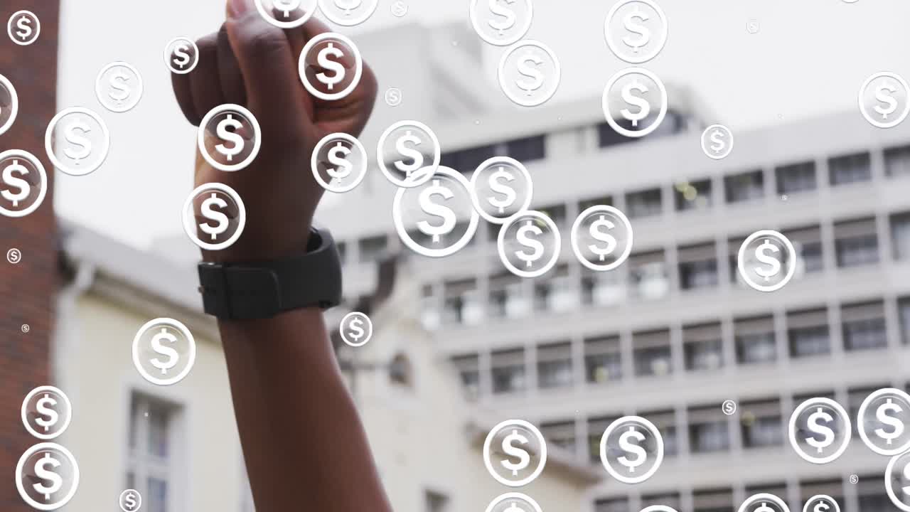 animación de dólares parpadeando sobre el puño de un hombre afroamericano