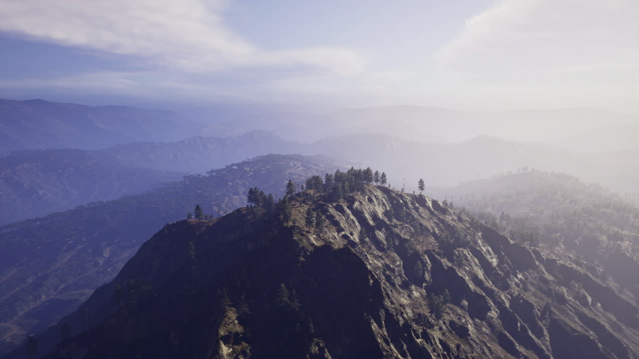 Mountain landscape with trees and mist in a serene setting