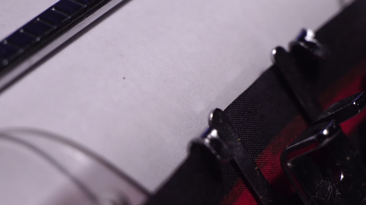 Year 1900, Typing on White Paper in Vintage Typewriter, Macro Close Up