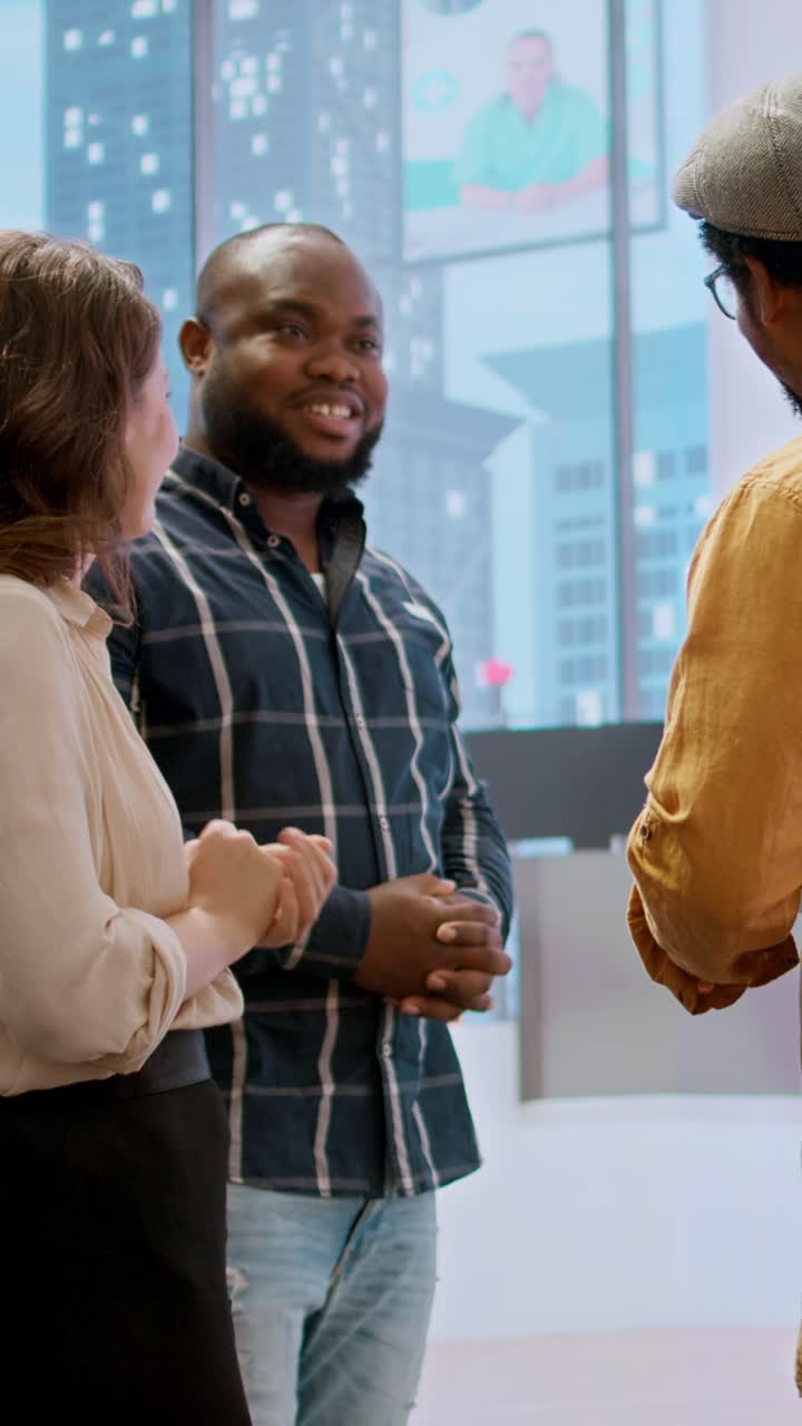 Diverse Business Colleagues Shaking Hands in Modern Office