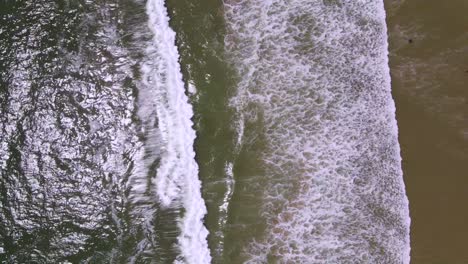 An-Excellent-Aerial-Shot-Of-Oceans-Waves-Lapping-The-Shores-Of-Pismo-Beach-California