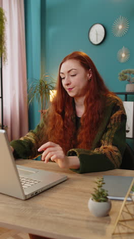 Businesswoman-employee-waves-hand-hi-gesture-greeting-welcomes-someone-at-camera-online-webinar