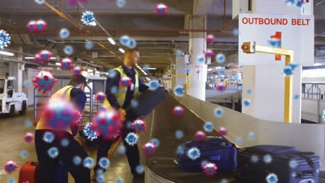 Animation-of-floating-macro-Covid-19-cells-over-two-Caucasian-male-airport-workers