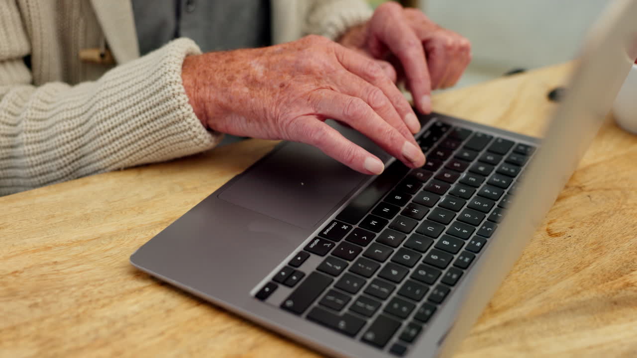 Senior Typing on Laptop