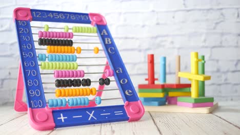 educational toys: abacus and wooden blocks