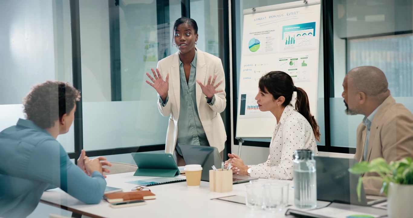 Businesswoman Presenting Market Analysis to Colleagues in Modern Office