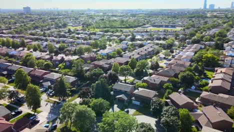 circling over houses on a summer day in mississauga