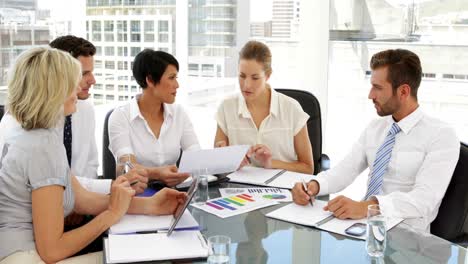 business people going over data at meeting