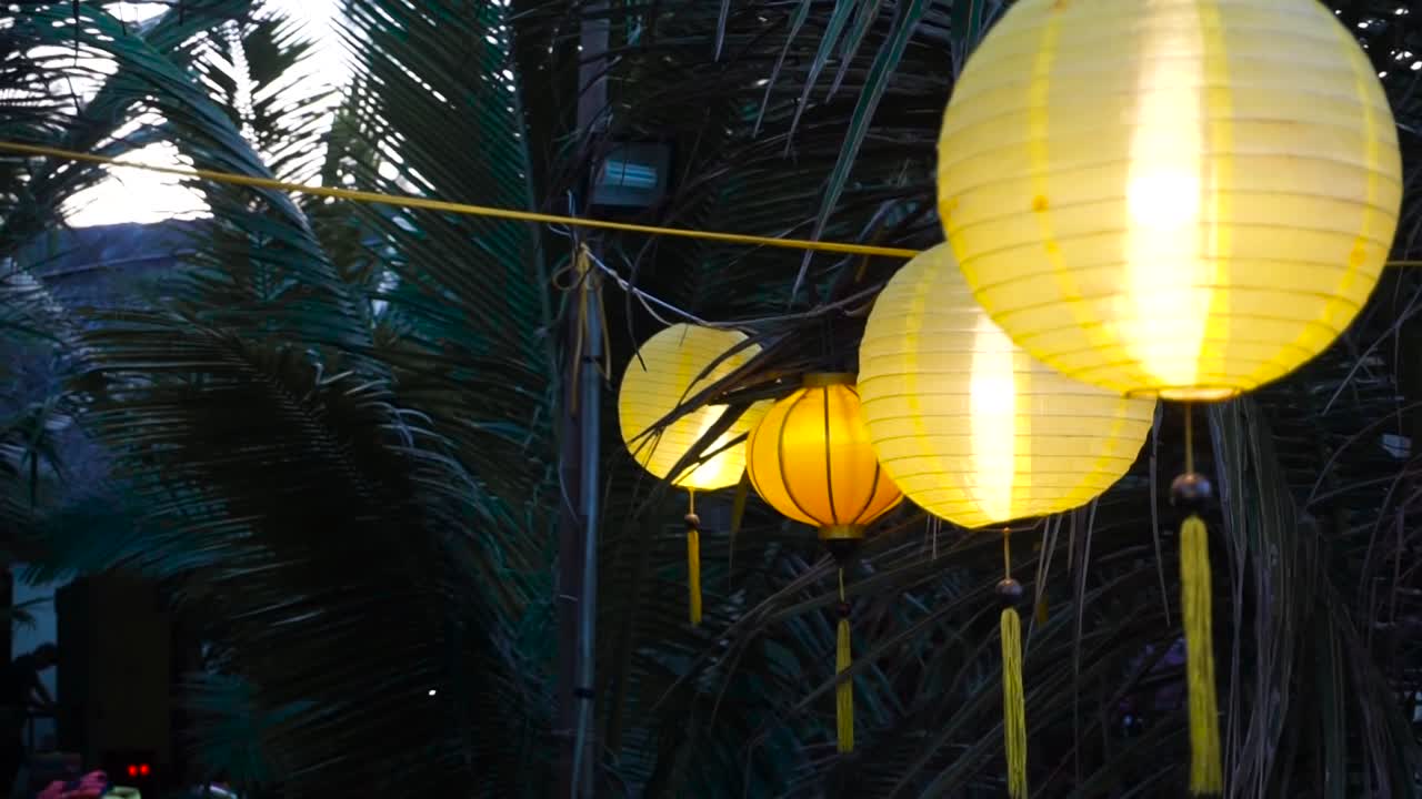Yellow iconic asian lamps found at backyard