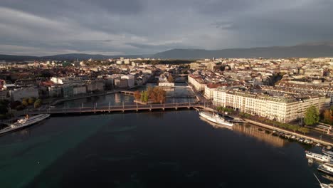 rhone river in the heart of geneva, switzerland, 4k aerial