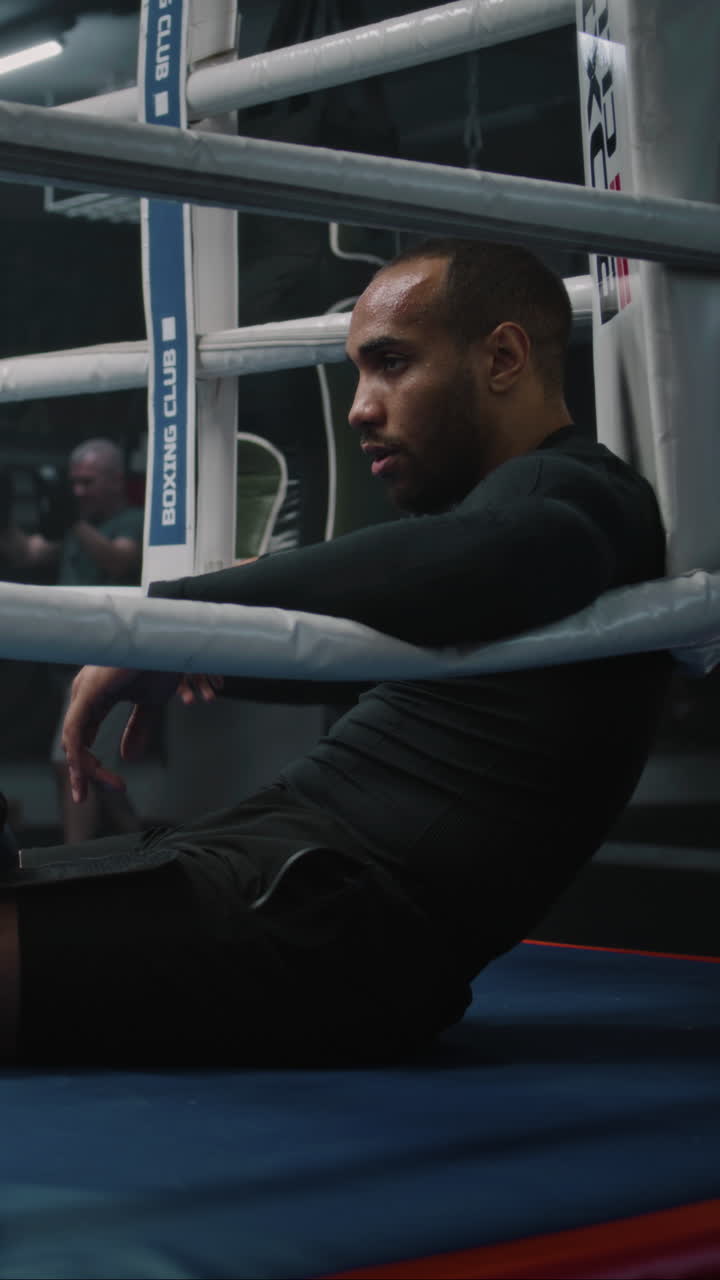 Boxer resting in the ring | Premium Stock Video Footage