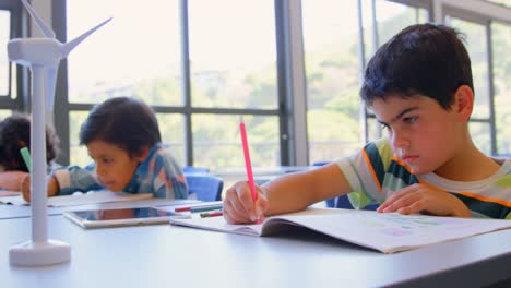 Schoolkids-studying-at-desk-in-the-classroom-at-school-4k