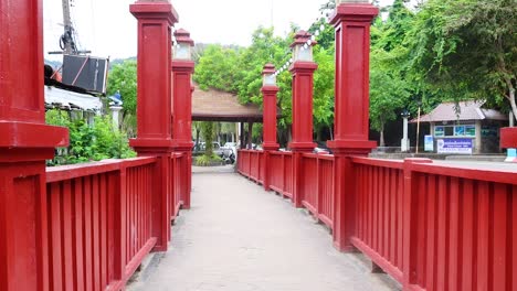 red wooden bridge walkway