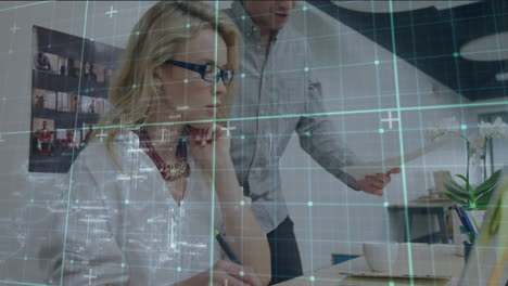 working with digital data animation overlay, business professionals collaborating in office