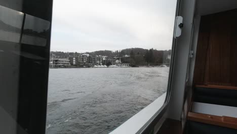 crossing a lake on a tourist boat.