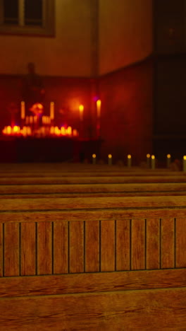 church interior with candles and wooden pews