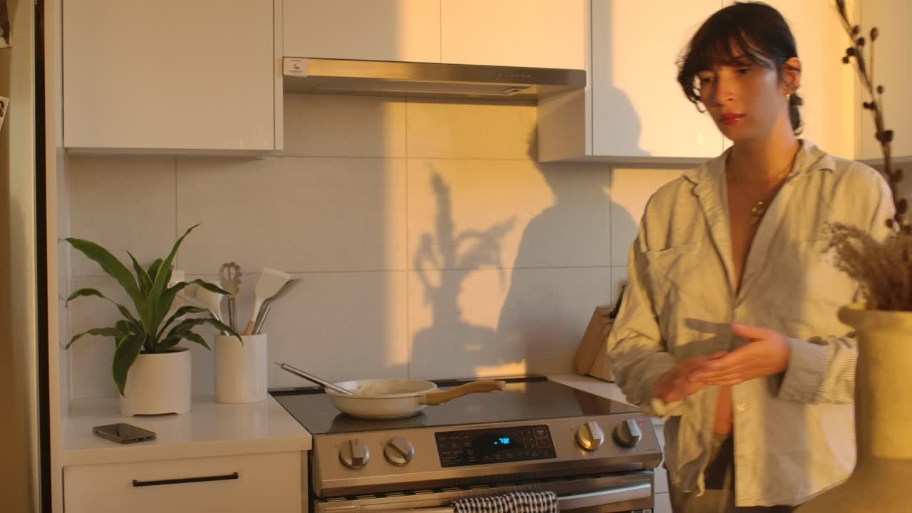 Pregnant Woman Working in the Kitchen in the Evening Sunlight STATIC