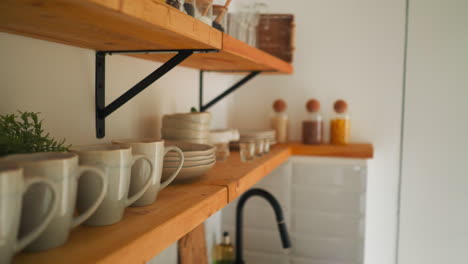 set of utensils in kitchen of glamping house. all necessary elements of kitchen available for guests spending time in nature while staying close to civilization