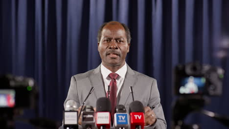 african american politician speaking on camera at press conference