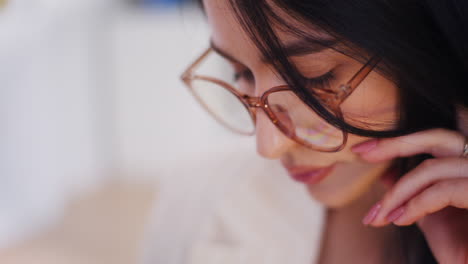 close-up of concentrated businesswoman's eyes working on project