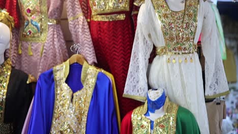 traditional costume arabic dress store, decorated woman clothing exhibition