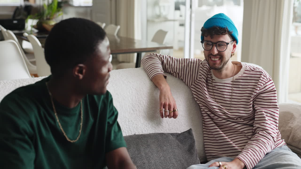 Two friends talking on a couch