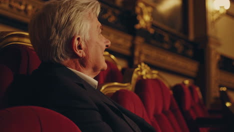 elderly man in opera house