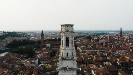 Aerial-view-of-the-Torre-dei-Lamberti-tower-standing-high-above-Verona,-Italy