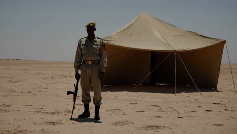soldier on patrol in the desert