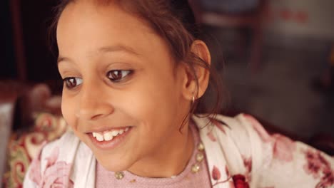 portrait of an indian child at home during coronavirus lockdown