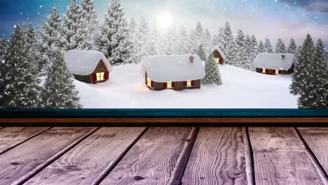 animación de nieve cayendo sobre las casas en el paisaje de invierno visto a través de la ventana