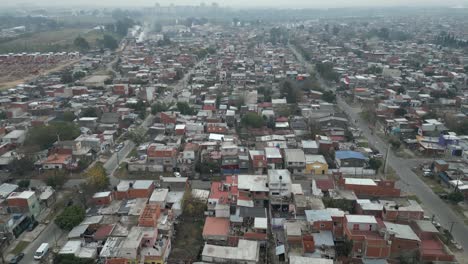 City-of-Villa-Fiorito-under-hazy-sky-due-to-climate-change-and-air-pollution,-Buenos-Aires,-Argentina