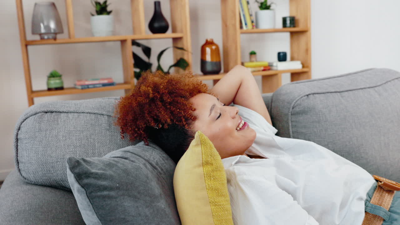 Black woman, calm and couch of a person on a work