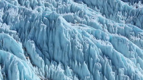 snow-packed layers of khumbu glacier at everest base camp, nepal. melting ice, high-altitude tents, thorny snow peaks, and sagarmatha’s iconic summit breathtaking himalayan exploration, drone view