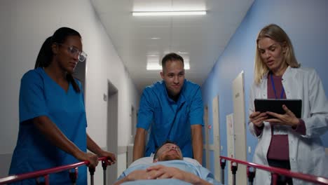 hospital staff attending to patient