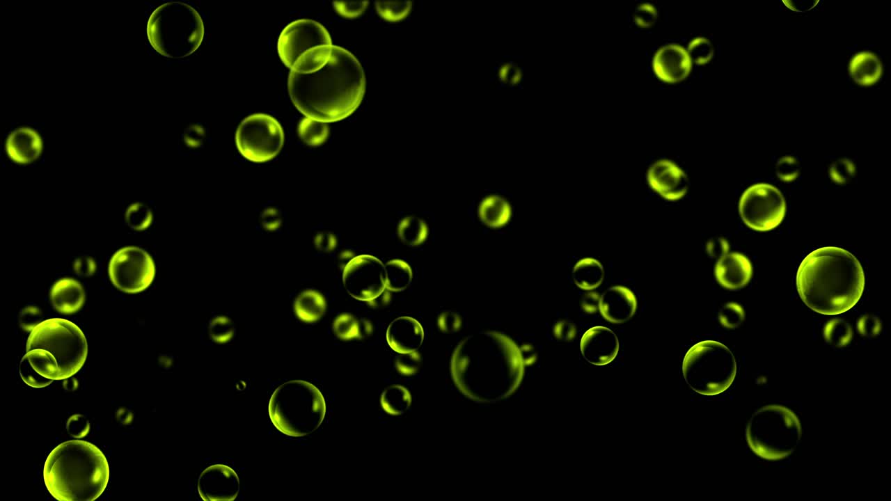 Yellow or golden bubbles float and drift upwards on a black background. A seamless loop perfect for celebration, luxury, or abstract motion graphics