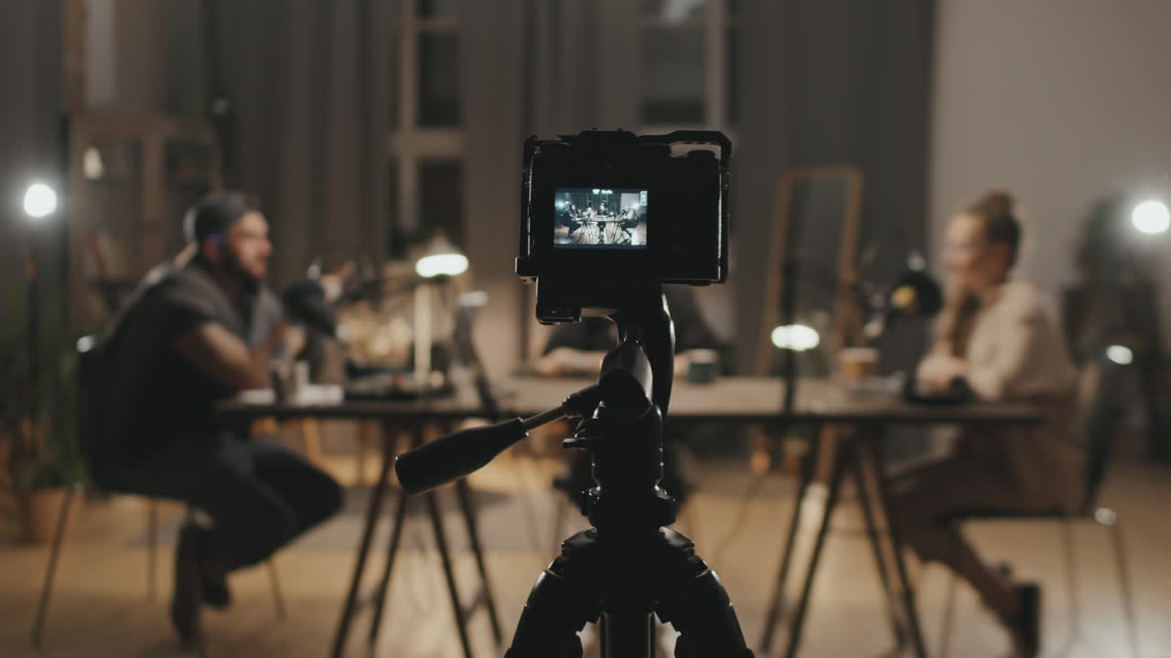 People Filming Podcast in Living Room