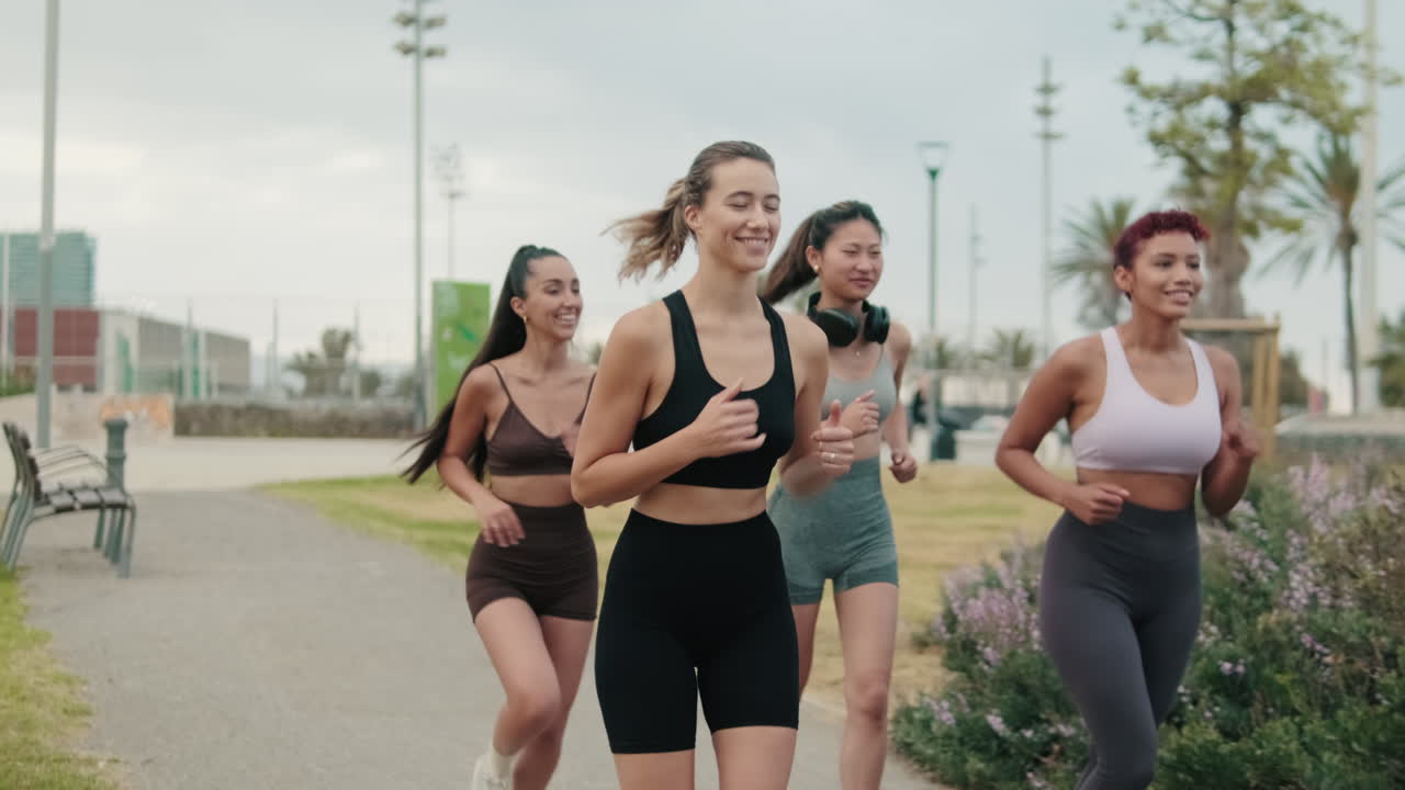 Friends Running and Enjoying Fitness Outdoors