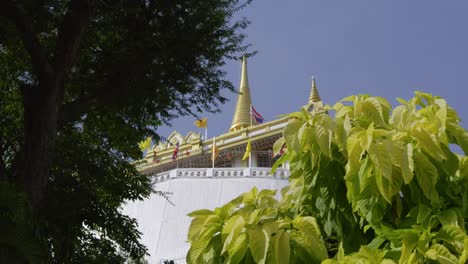 stunning cinematic slow motion slider over golden mount temple in bangkok