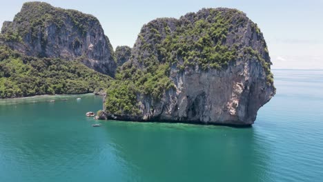 koh poda beach reveal behind famous limestone cliff