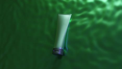 cosmetic tube mockup on green silk fabric