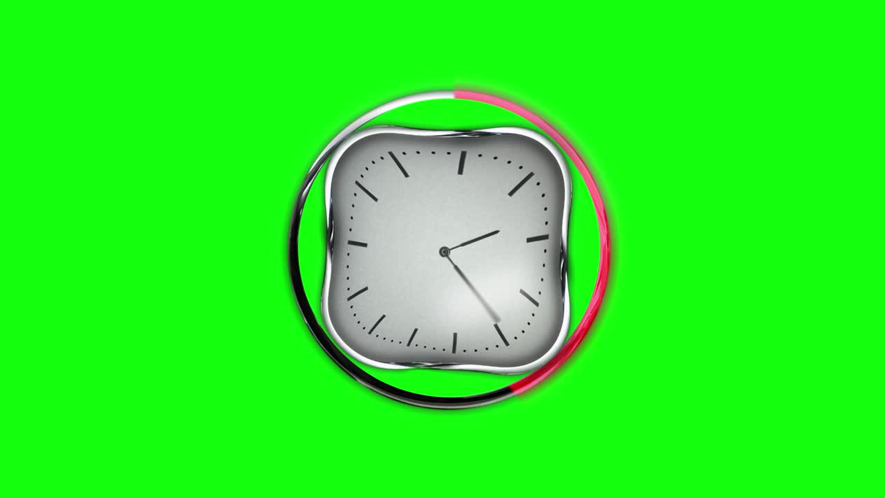 Metal clock on green screen