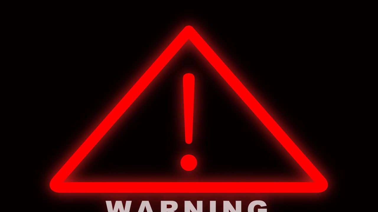 Glowing Red Warning Sign with Exclamation Mark on Black Background