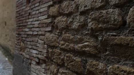 close-up of brick wall in naples alley