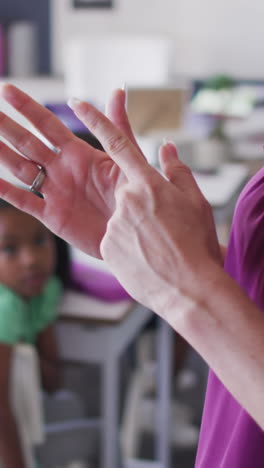video of midsection of caucasian female school teacher during lessons