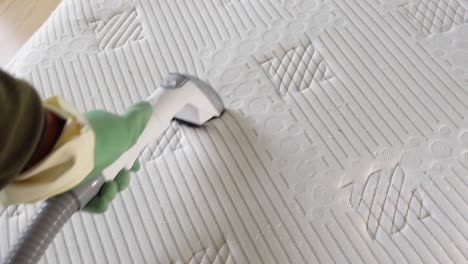 cleaning a mattress with a vacuum
